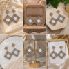 Luxury geometric mirror earrings with sparkling crystal