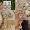 Luxury pearl crystal bridal earrings with sparkling stones and elegant pearl detailing for weddings and special occasions