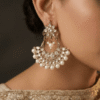 Chandbali earrings with elegant pearl and sparkling stone detailing